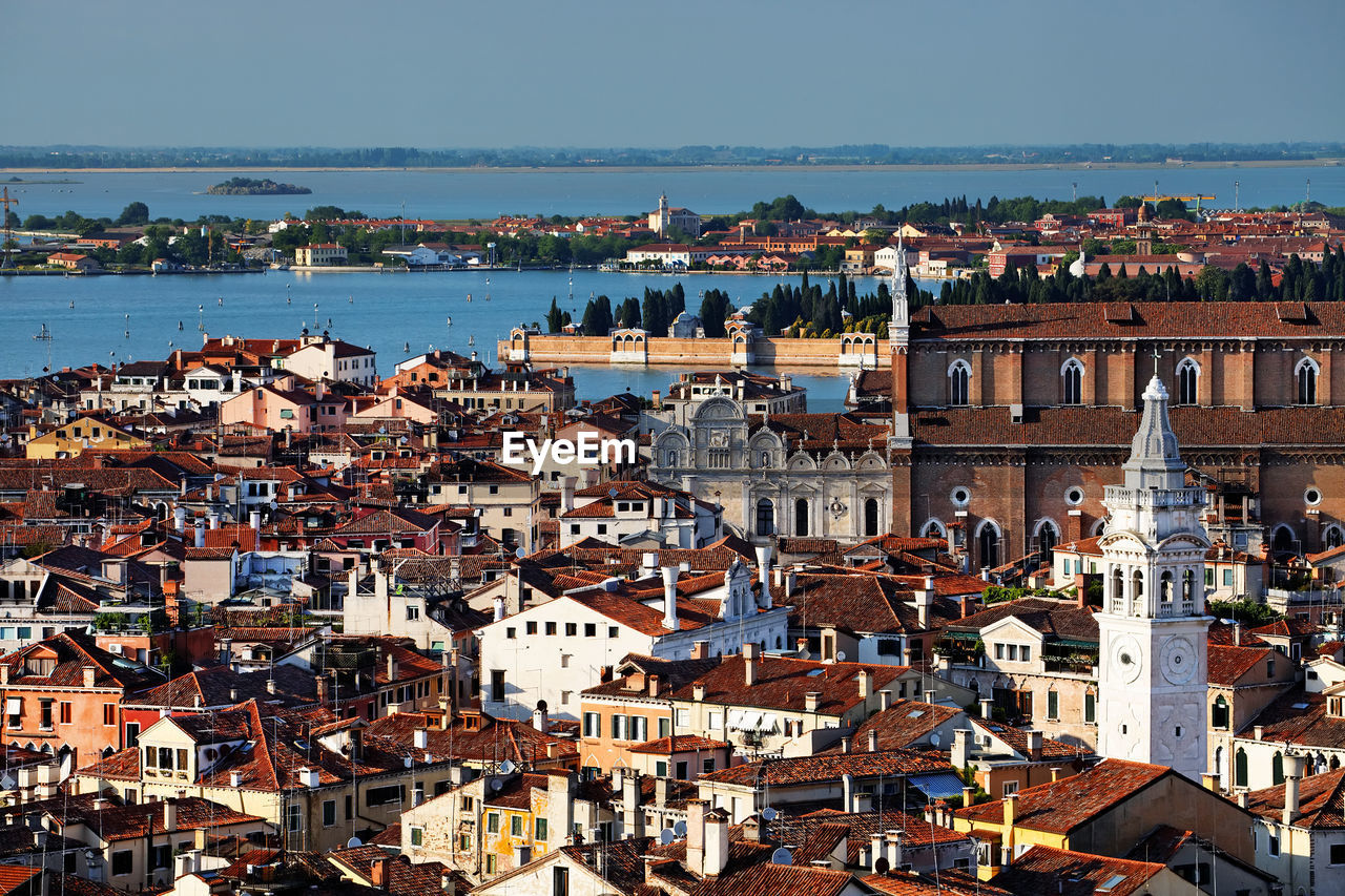 High angle view of residential district by river