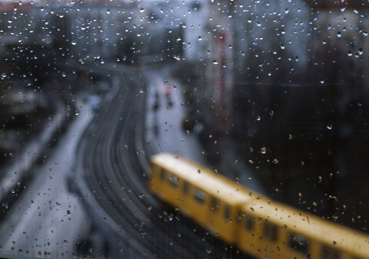 View of train passing by seen through window