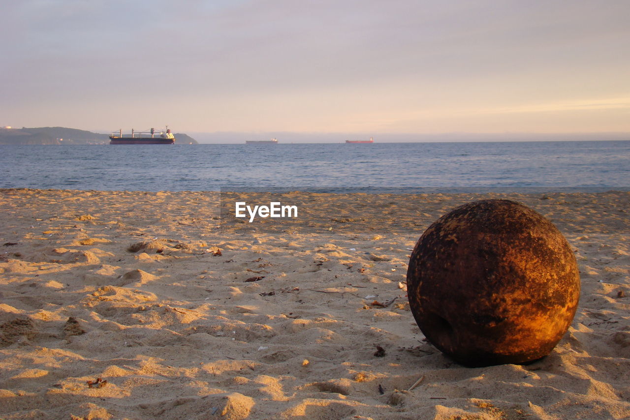 View of calm beach against sky