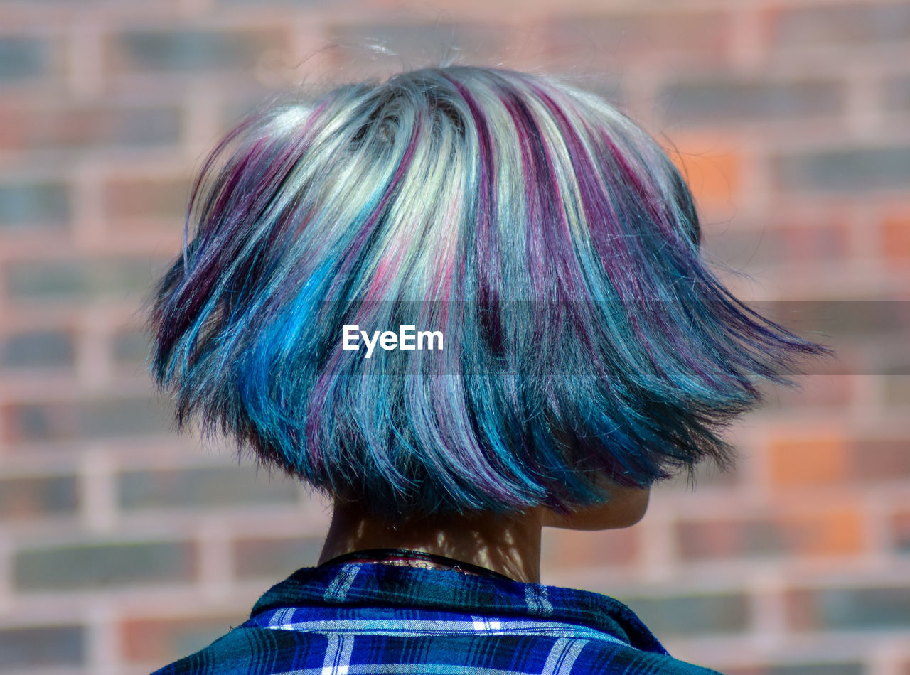 Rear view of young woman with dyed hair