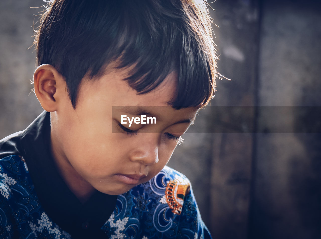 Close-up of boy looking away