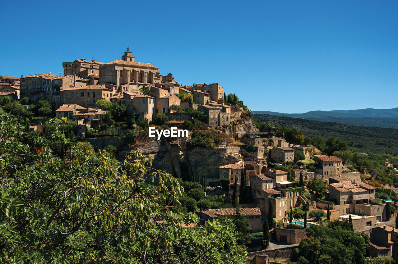 Panoramic view of the gordes village on top of hill, in the french provence.