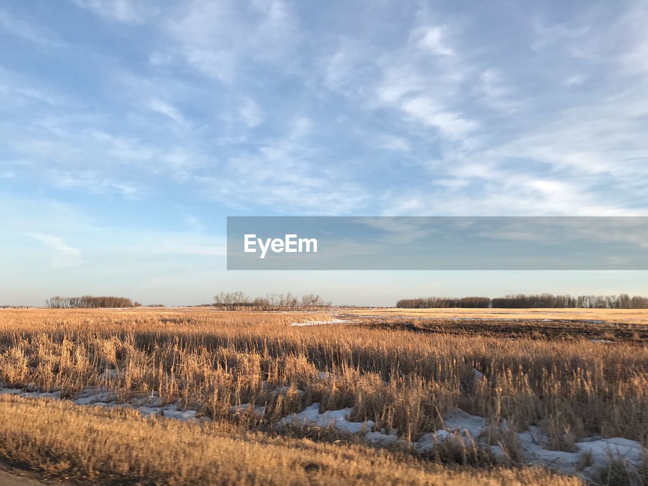 Sky scape and beautiful farm land cover the horizon behold natures tapestry