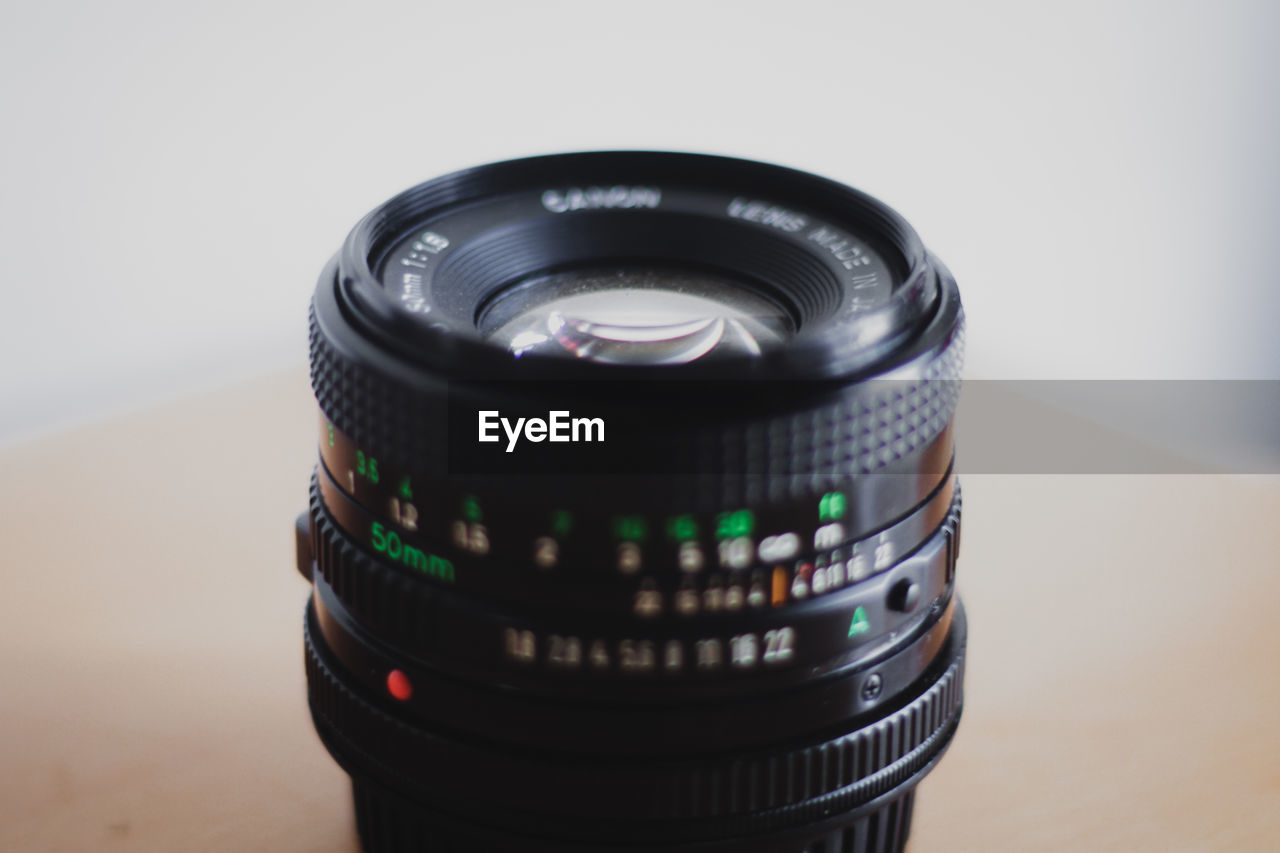 Close-up of lens on table