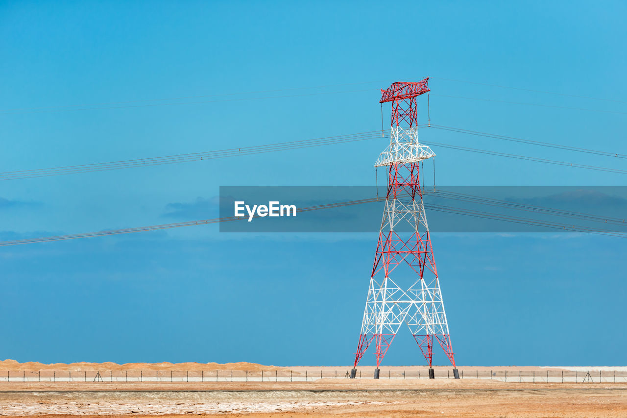 LOW ANGLE VIEW OF ELECTRICITY PYLONS AGAINST SKY