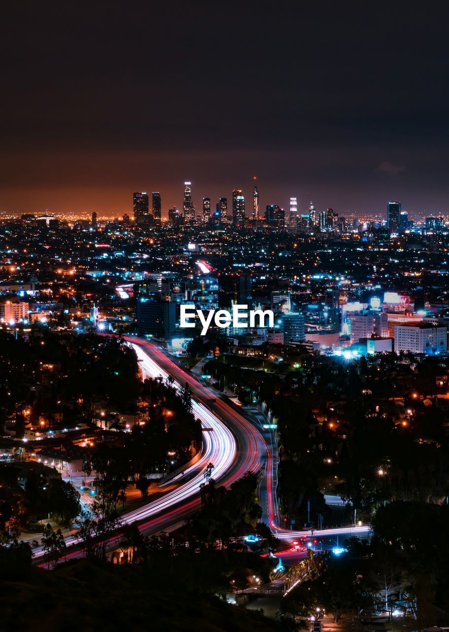 High angle view of illuminated cityscape at night