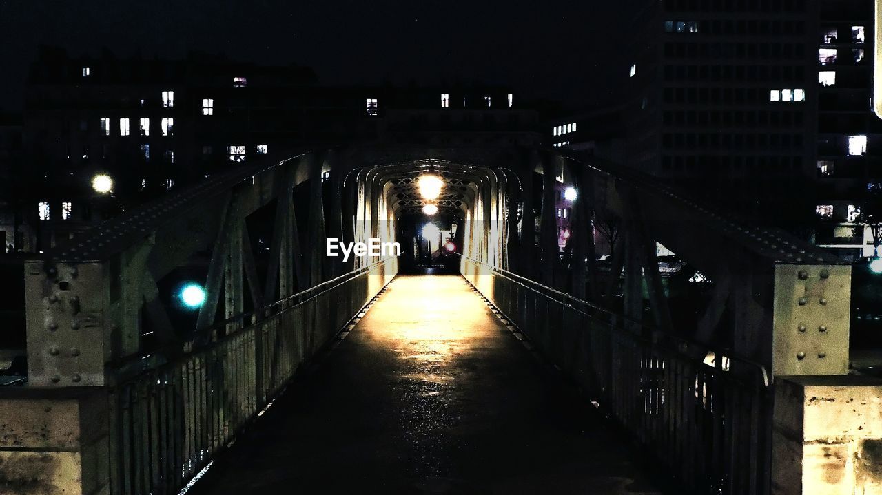 ILLUMINATED STREET AT NIGHT