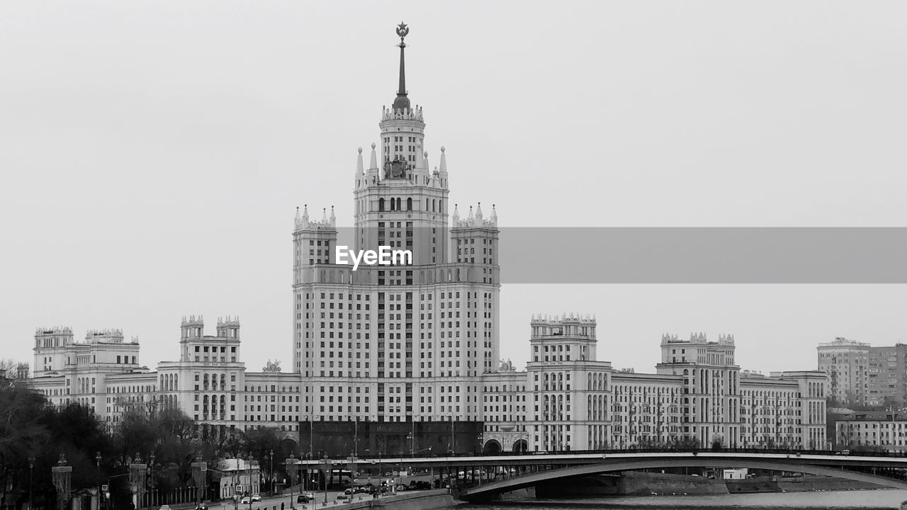 BUILDINGS IN CITY AGAINST SKY