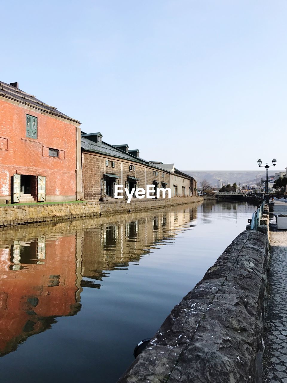 REFLECTION OF BUILDINGS IN WATER