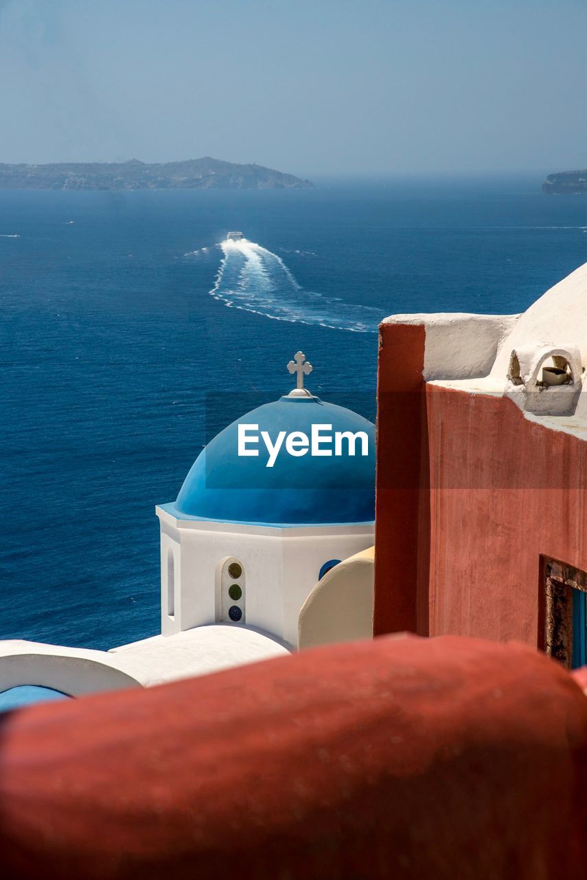 Scenic view of sea against blue sky