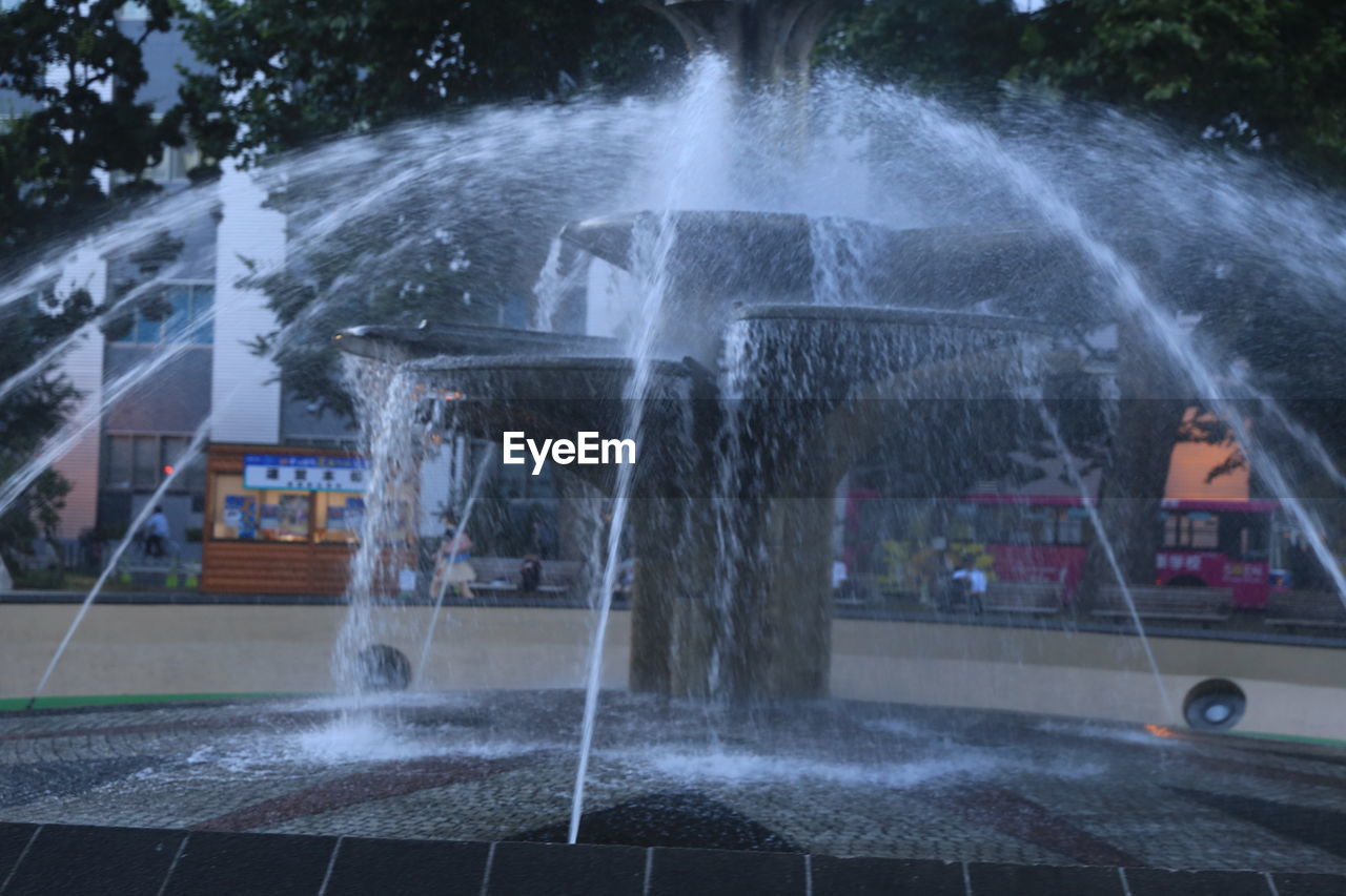 FOUNTAIN IN CITY STREET