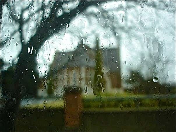 CLOSE-UP OF WATER DROPS ON WINDOW