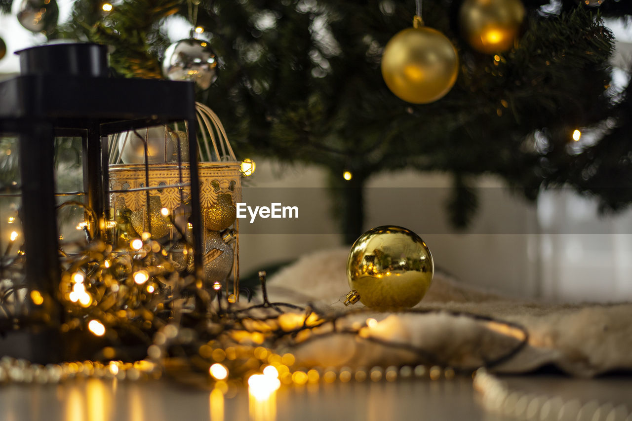 Close-up of illuminated christmas lights on tree