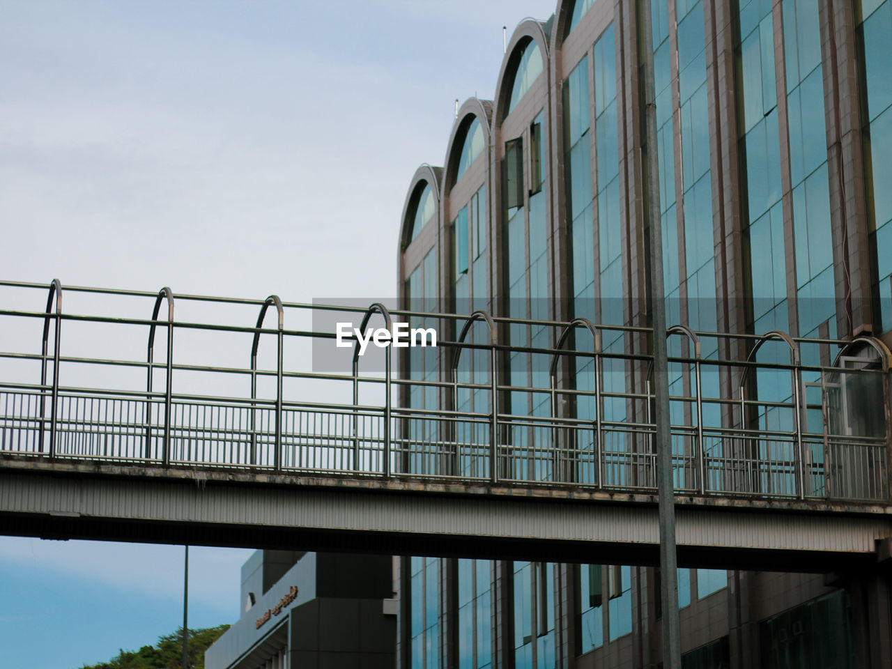 Low angle view of modern building against sky