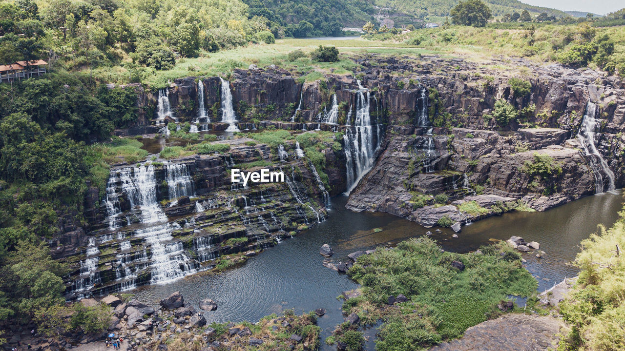 HIGH ANGLE VIEW OF WATERFALL