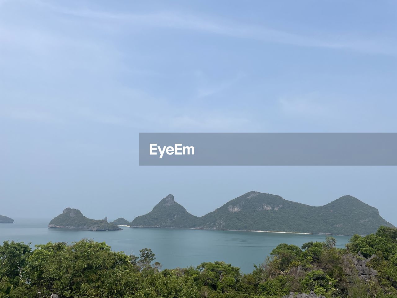 scenic view of sea against blue sky