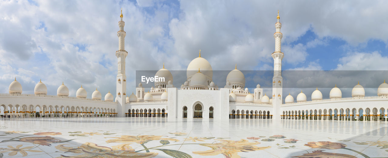 Panoramic view of mosque against sky in city