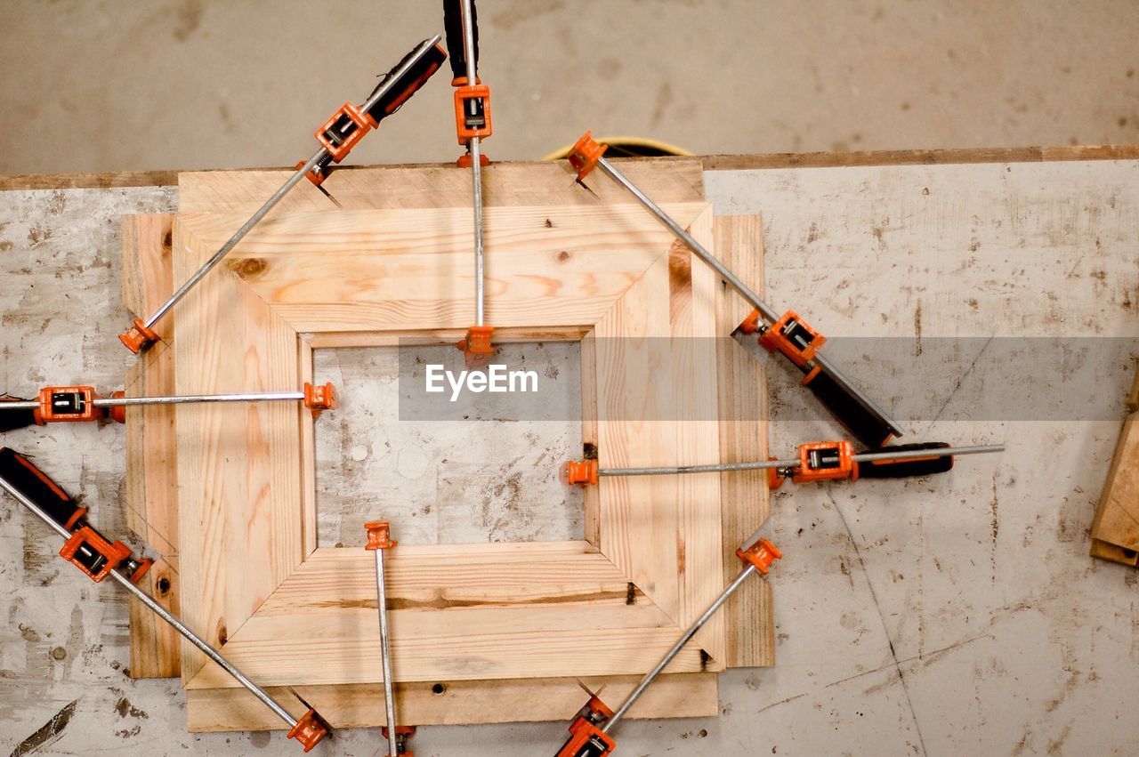 Equipment with wooden frame on wall