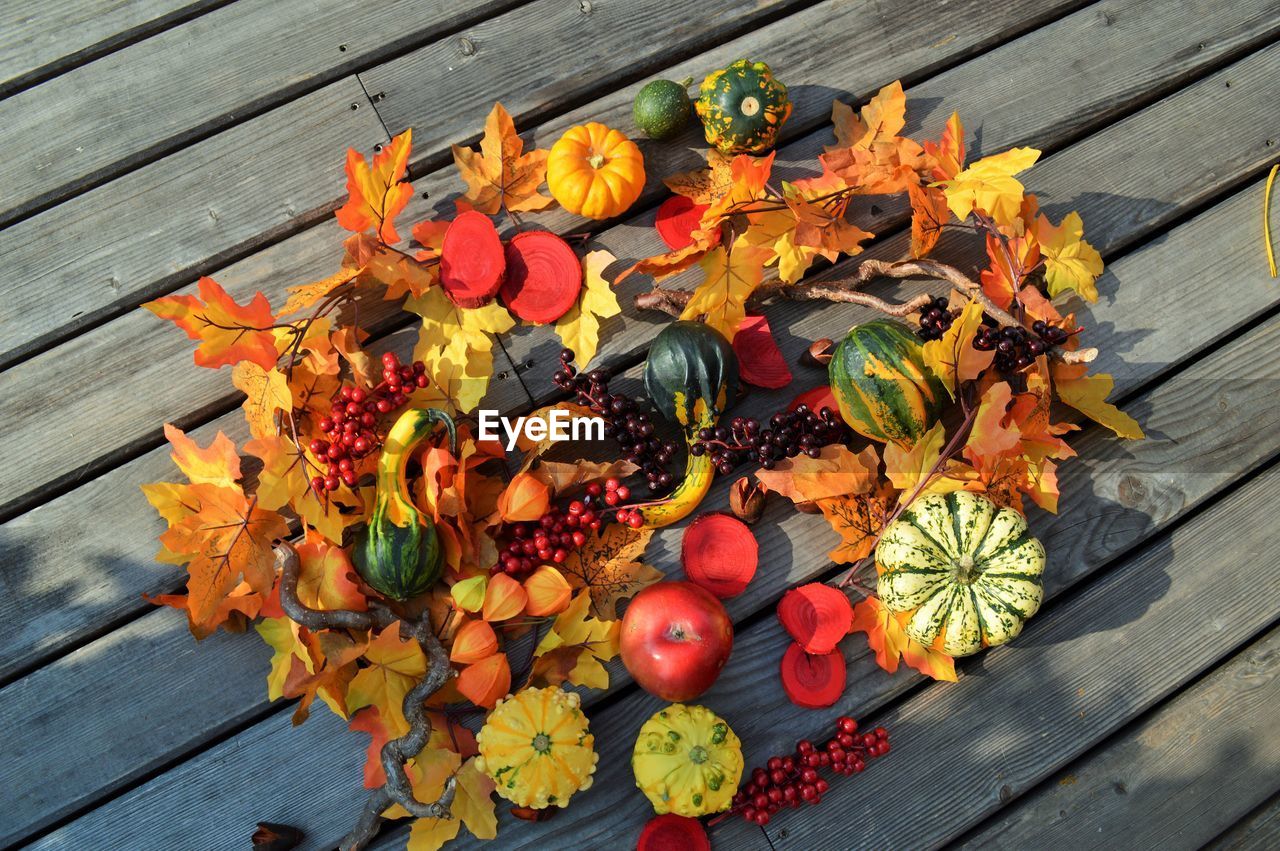 High angle view of vegetables and leaves on table