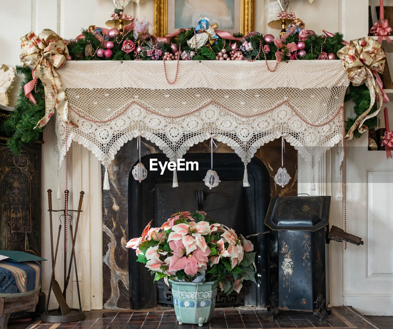 Old fashioned christmas decorations on fireplace