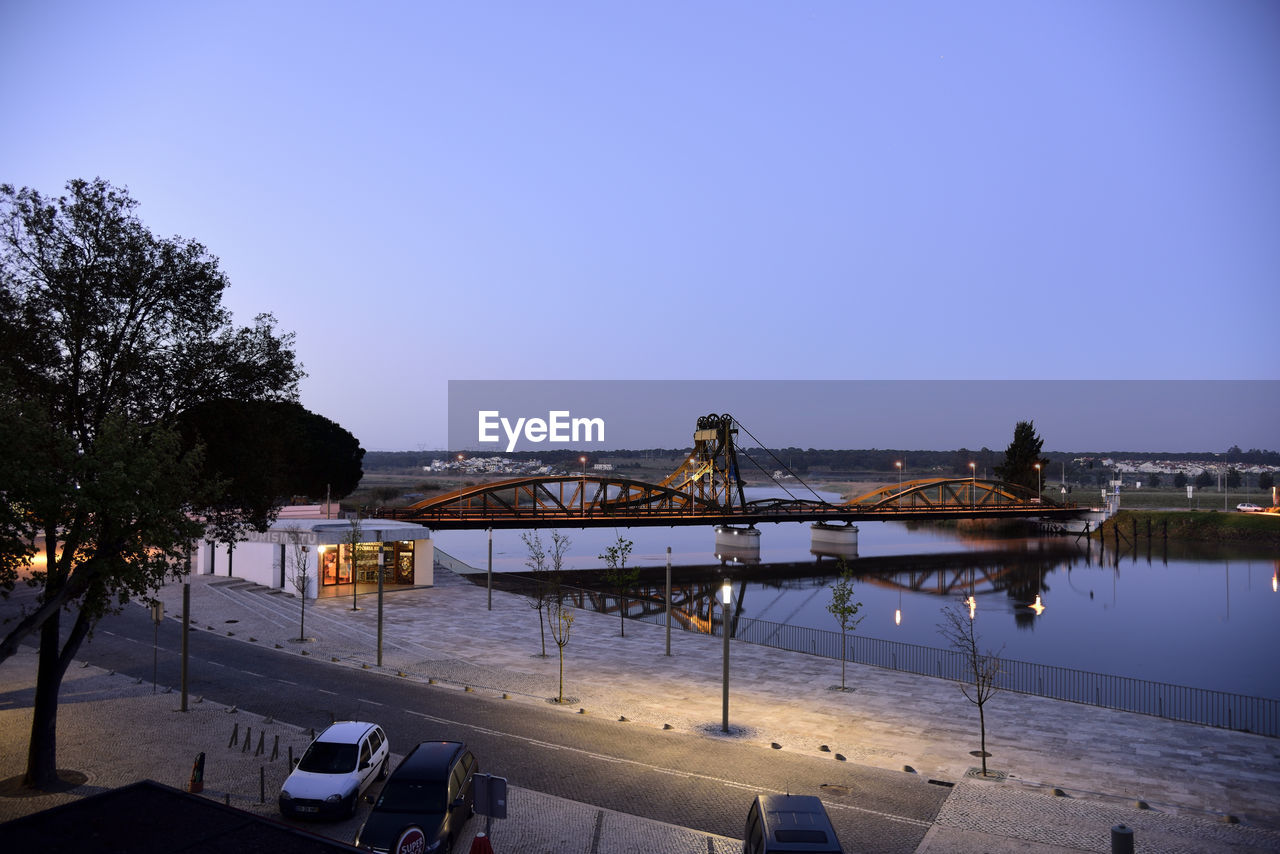 SCENIC VIEW OF PARK AGAINST CLEAR SKY AT NIGHT