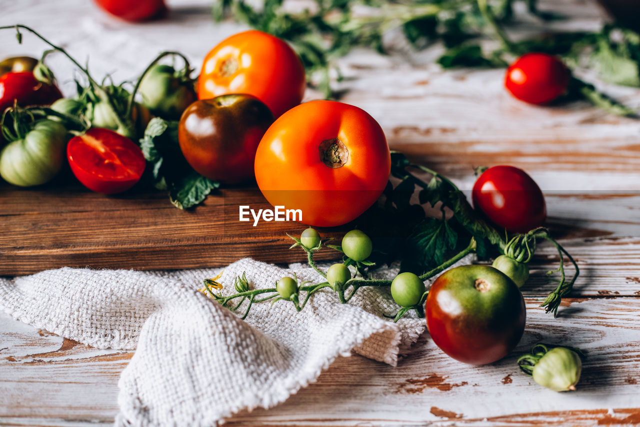 TOMATOES GROWING ON TREE