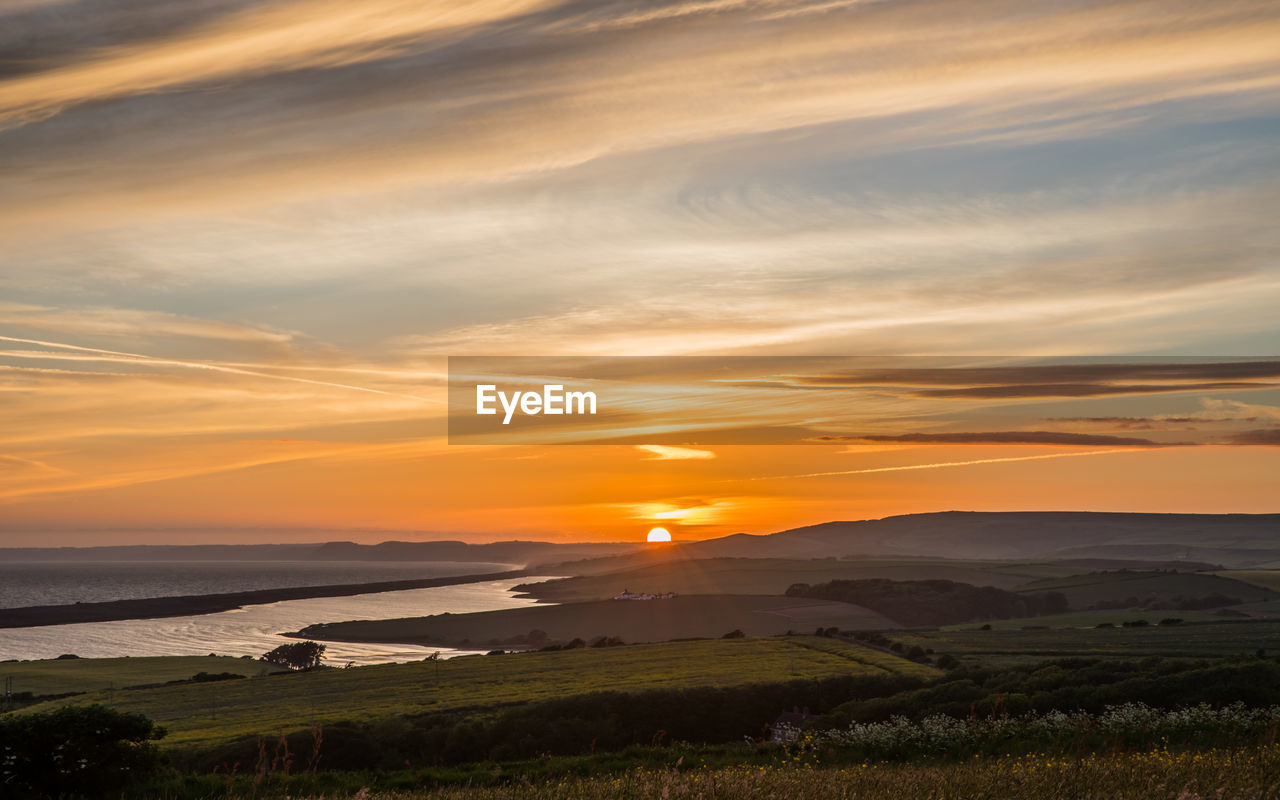 Sunset at sea barn farm, fleet, weymouth, uk