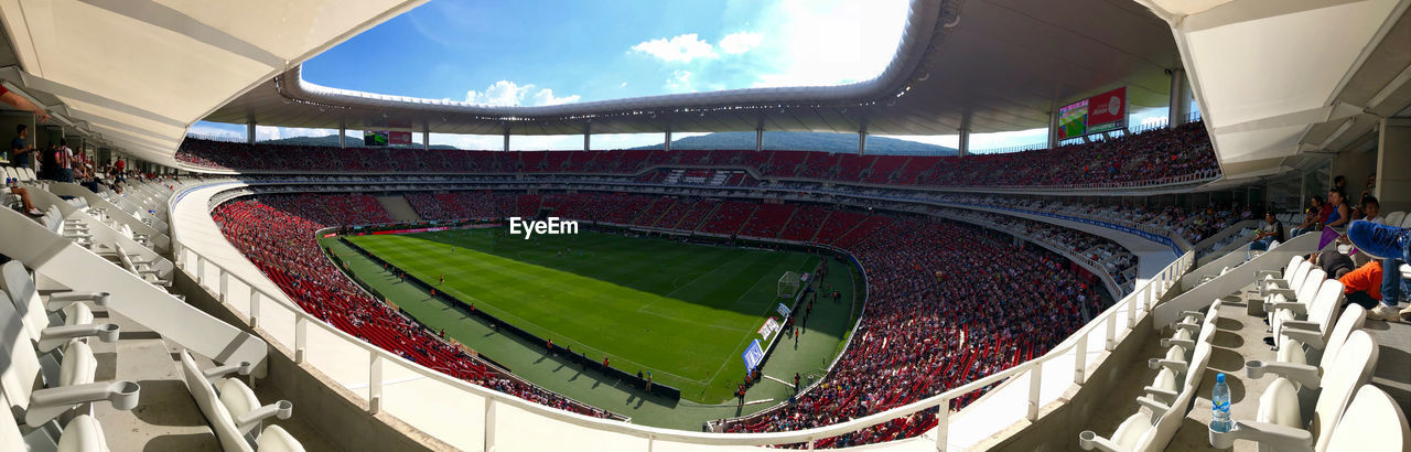 High angle view of crowd on stadium with sky