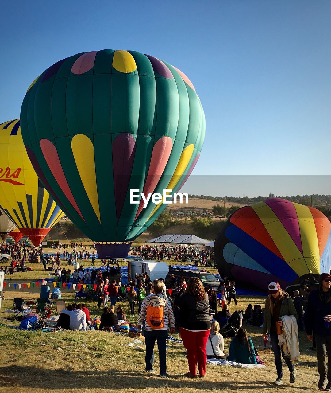 PEOPLE IN HOT AIR BALLOONS