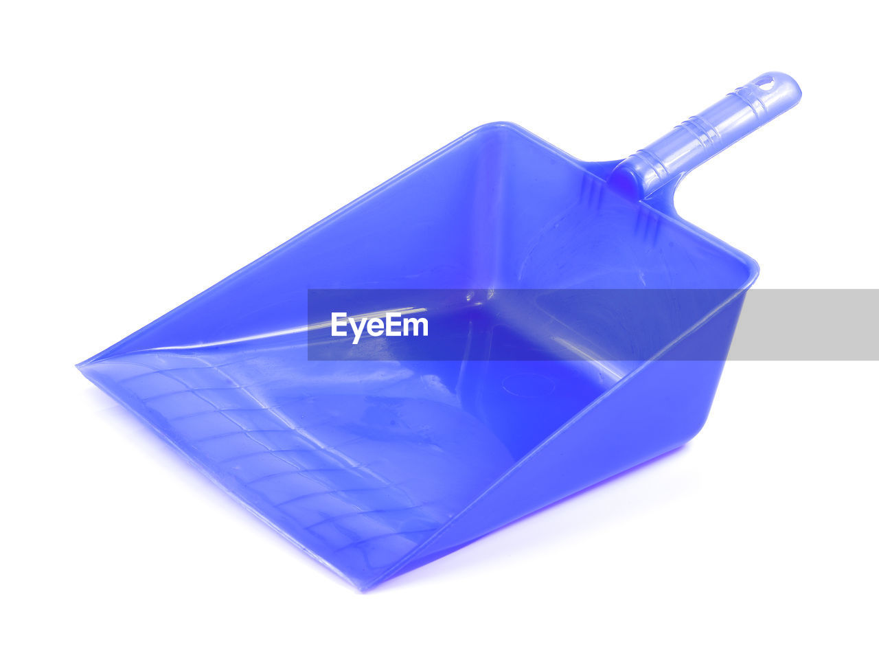High angle view of dustpan on white background
