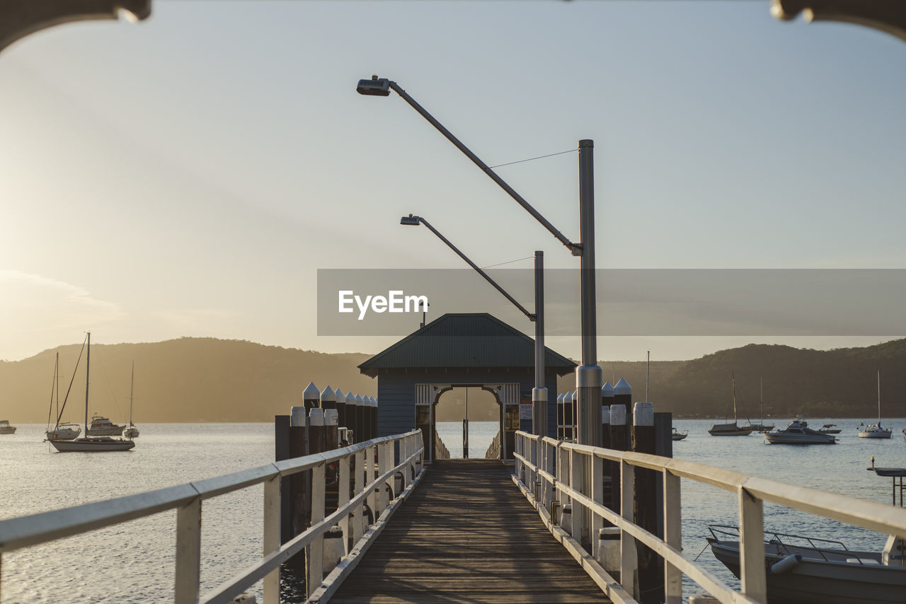 Pier over sea against sky
