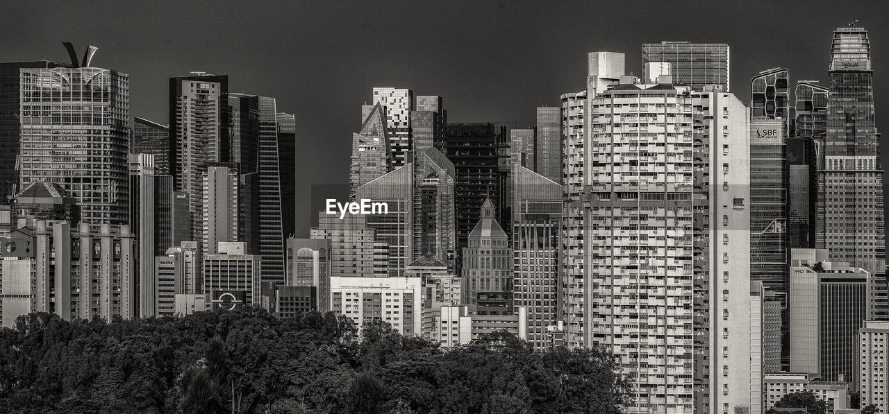 High angle view of modern buildings against sky