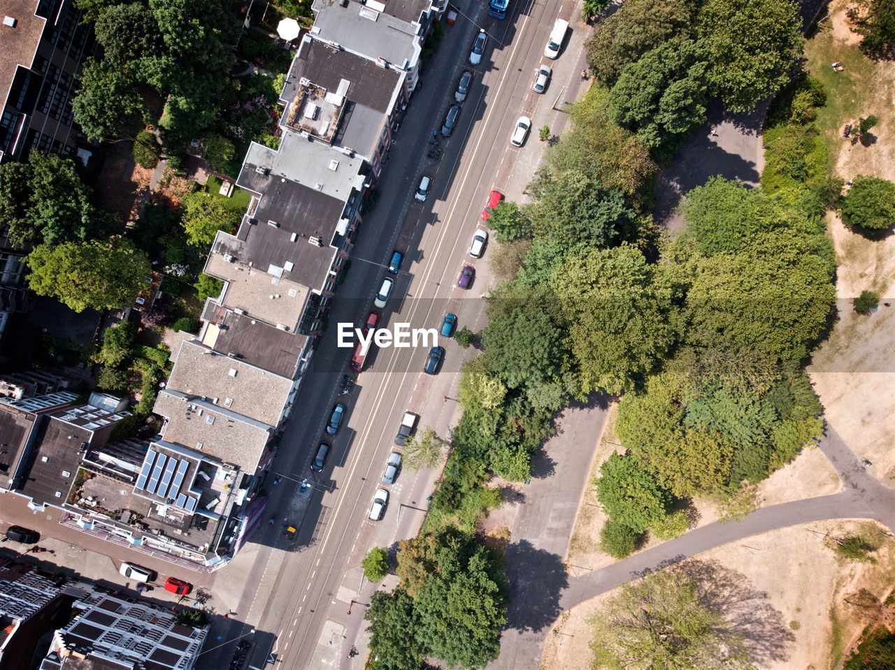 HIGH ANGLE VIEW OF STREET AND BUILDINGS IN CITY