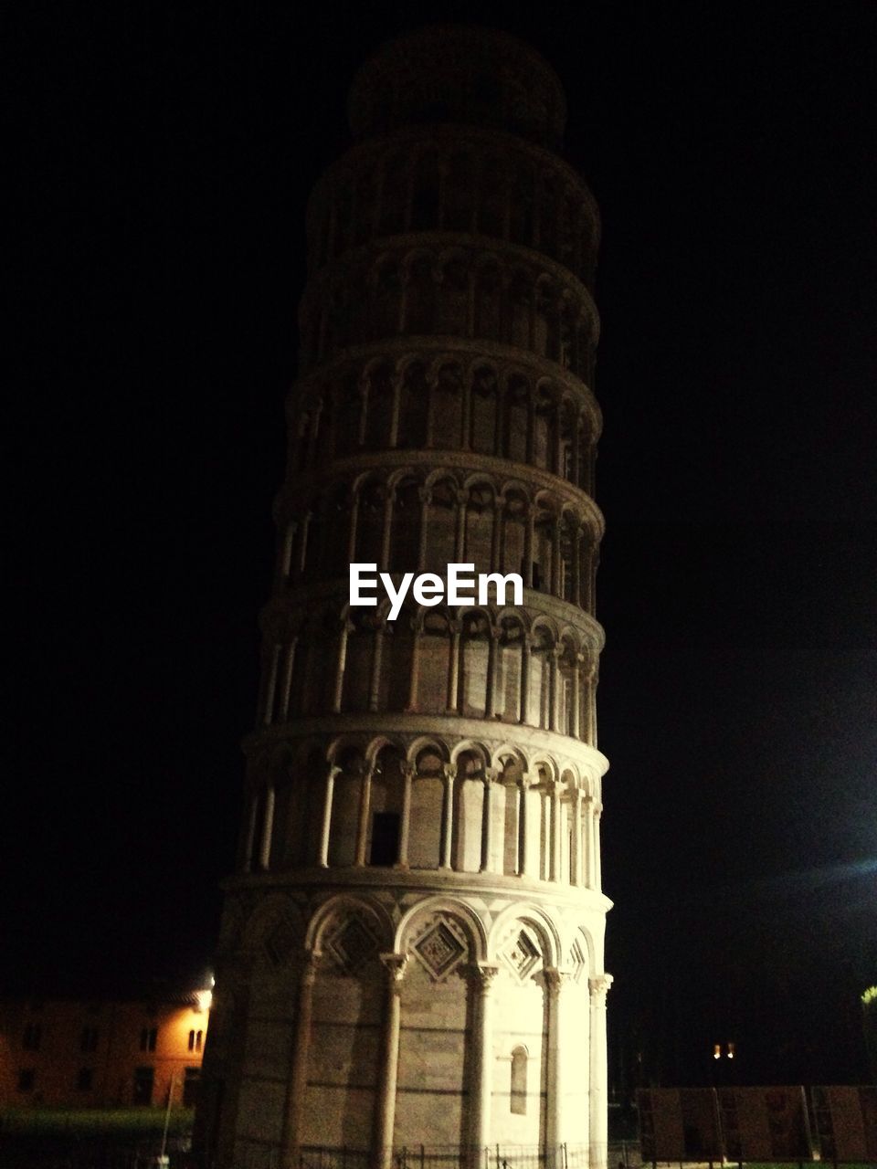 Low angle view of illuminated building at night