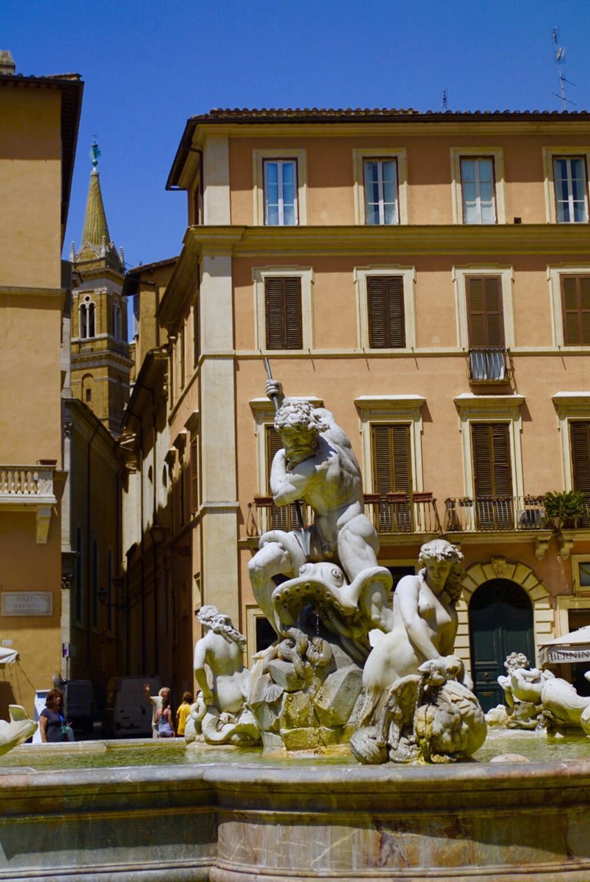 LOW ANGLE VIEW OF STATUE OF BUILDING