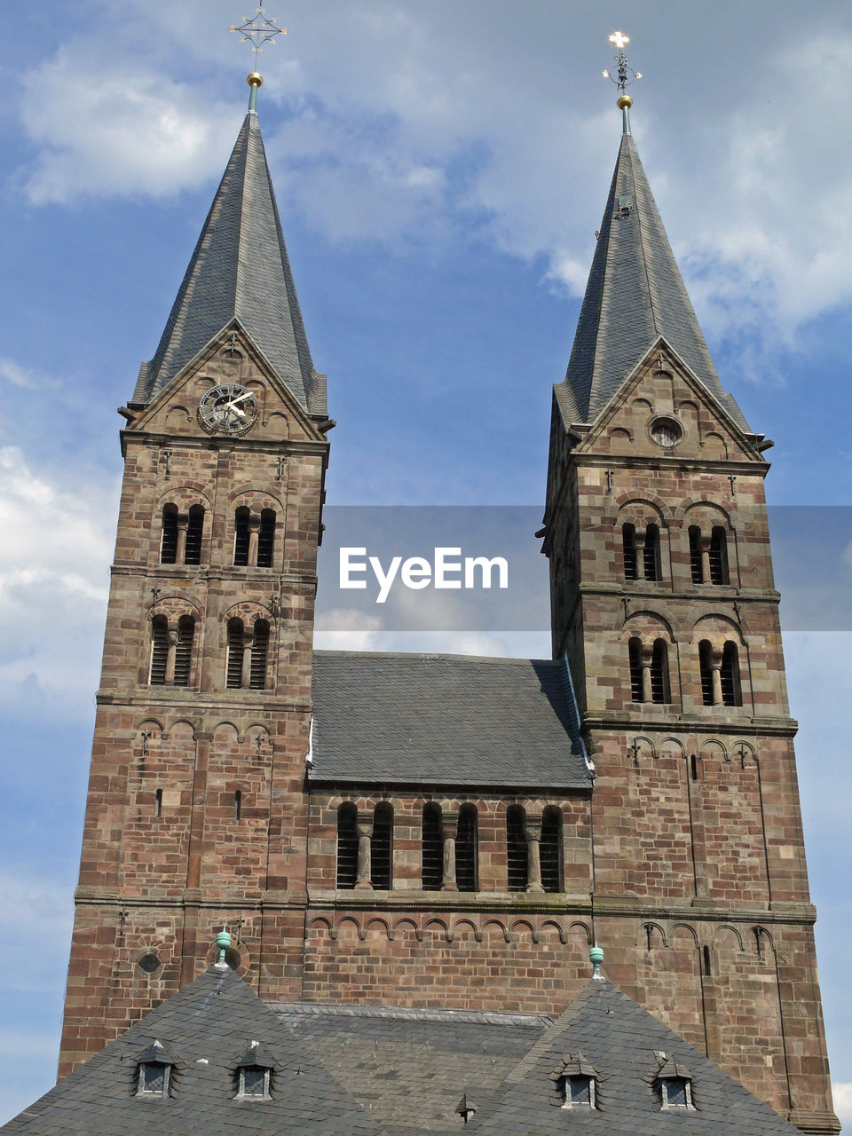 LOW ANGLE VIEW OF A CLOCK TOWER