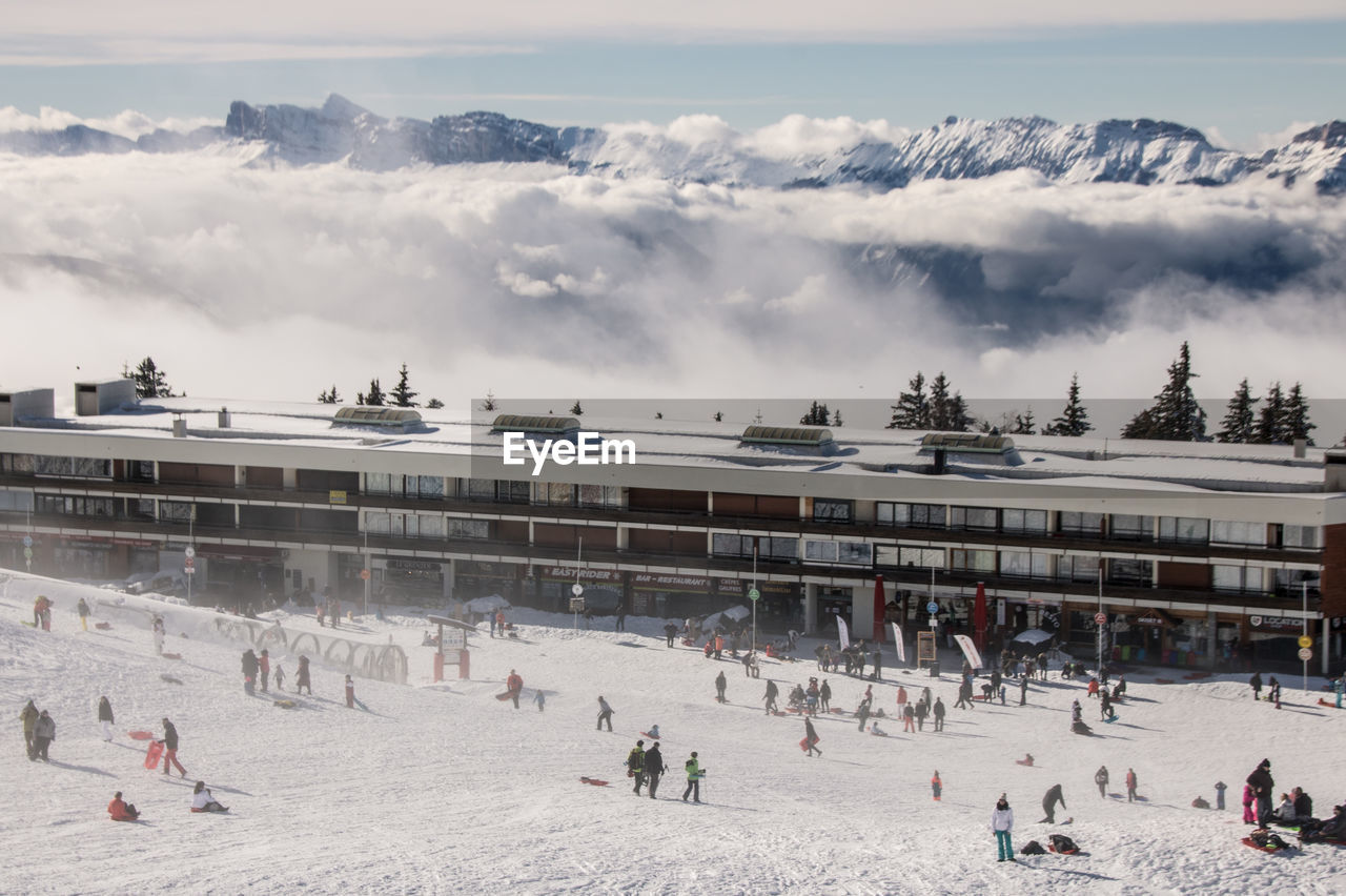 High angle view of people in ski resort in alps