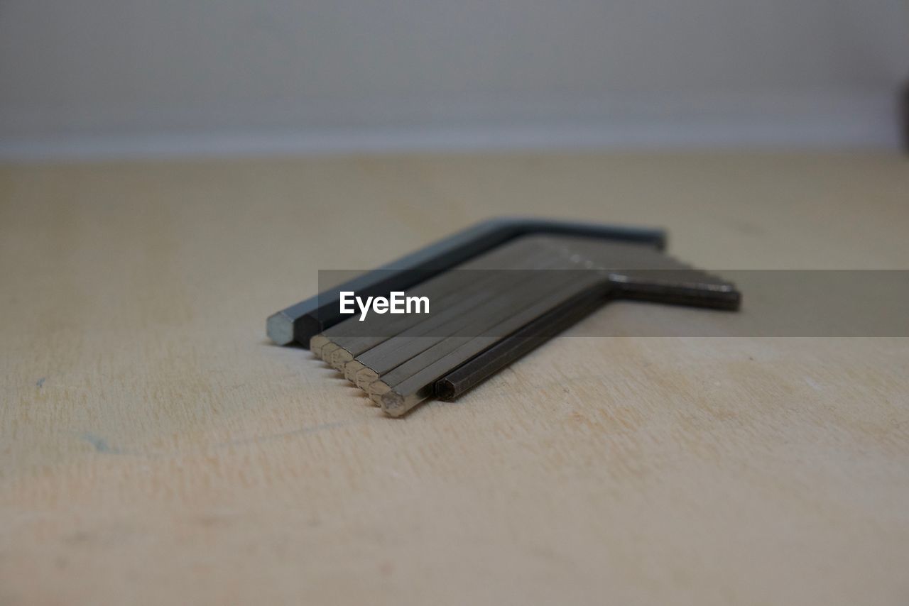 High angle view of metal on table