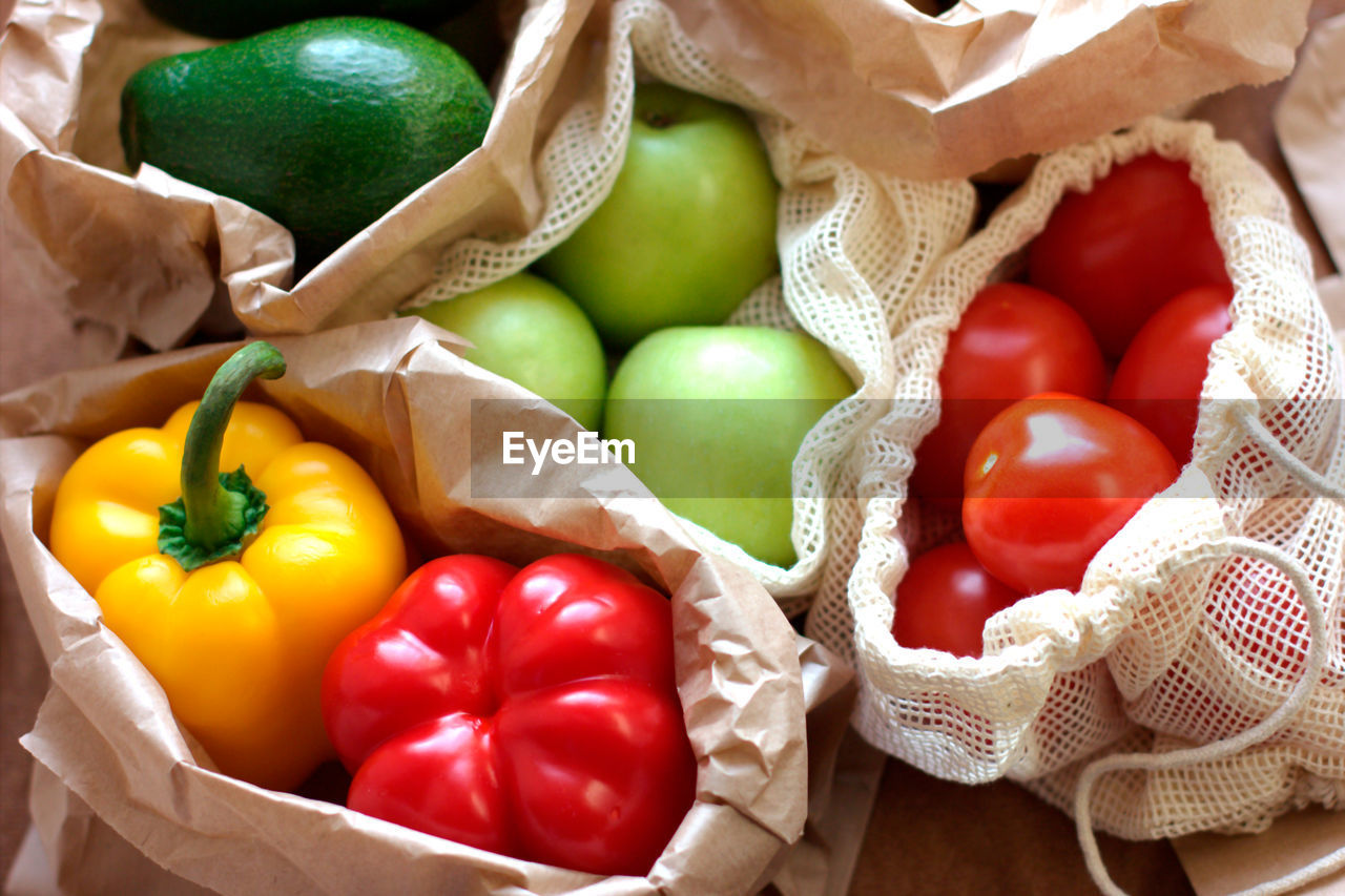 Zero waste shopping. eco bags with fruits and vegetables in tote, sustainable lifestyle concept.  