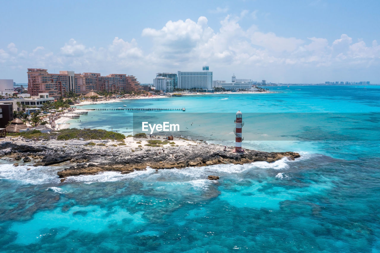 Aerial view of punta cancun adorned lighthouse