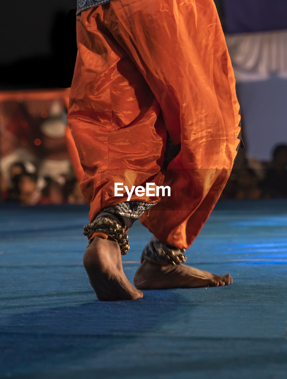 Low section of woman dancing on stage