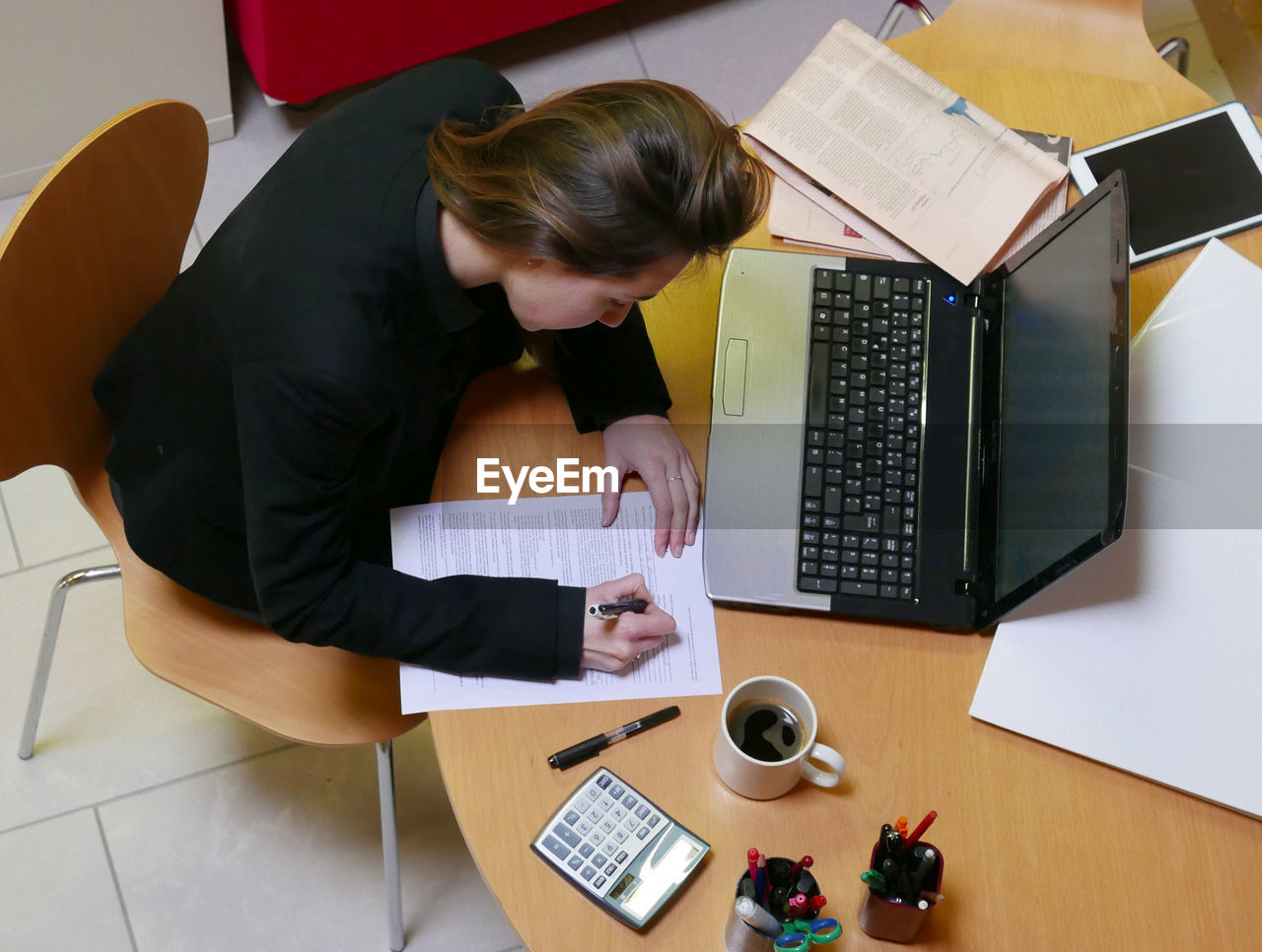 High angle view of woman working in office
