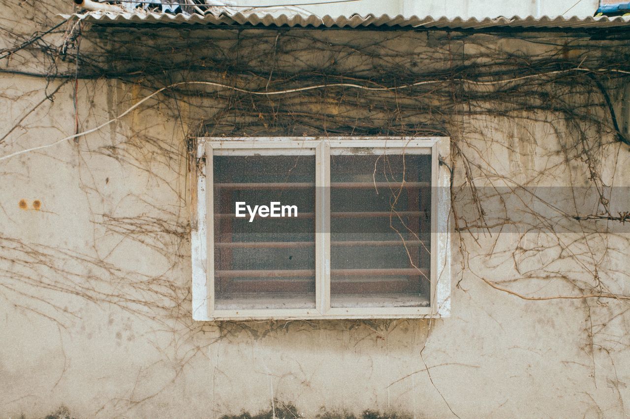 Closed window of old house