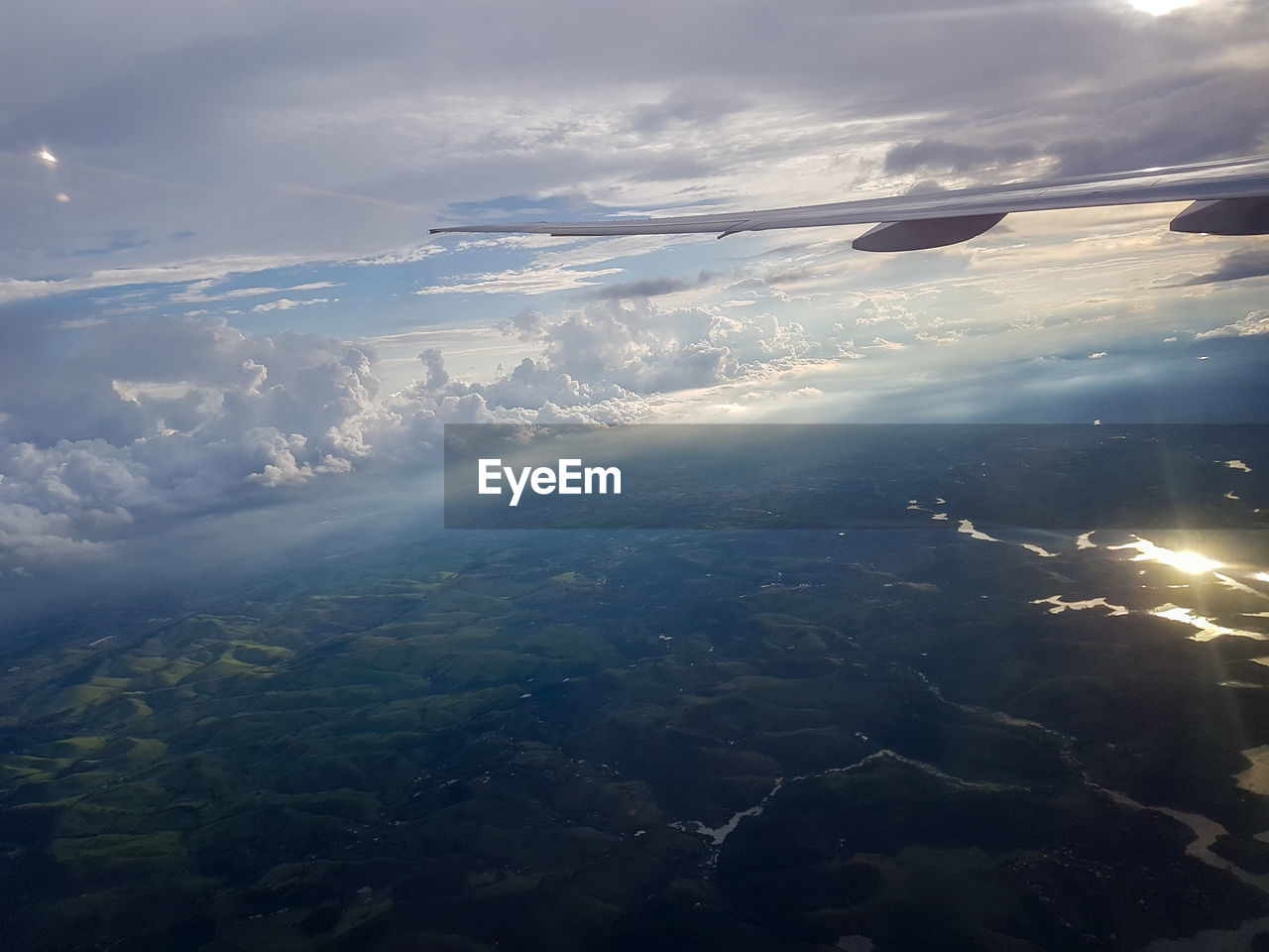 AERIAL VIEW OF CLOUDS OVER SEA AGAINST SKY