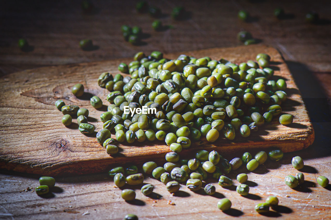 high angle view of roasted coffee beans on table