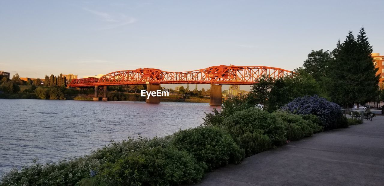 VIEW OF BRIDGE OVER RIVER AGAINST SKY