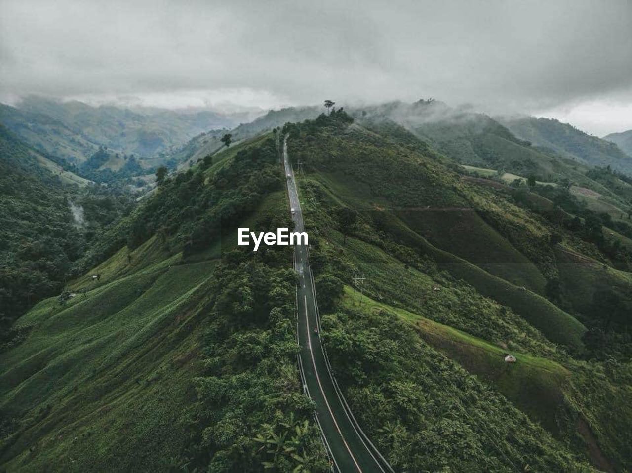 High angle view of road amidst mountains