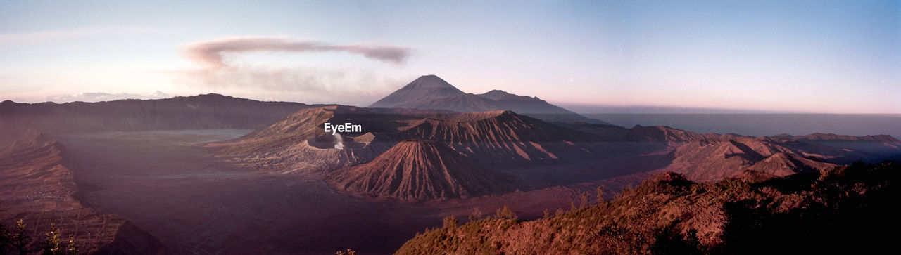 VIEW OF SMOKE EMITTING FROM VOLCANIC MOUNTAIN