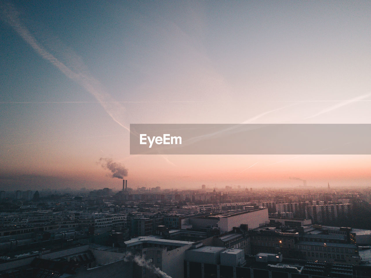 High angle view of buildings against sky during sunset