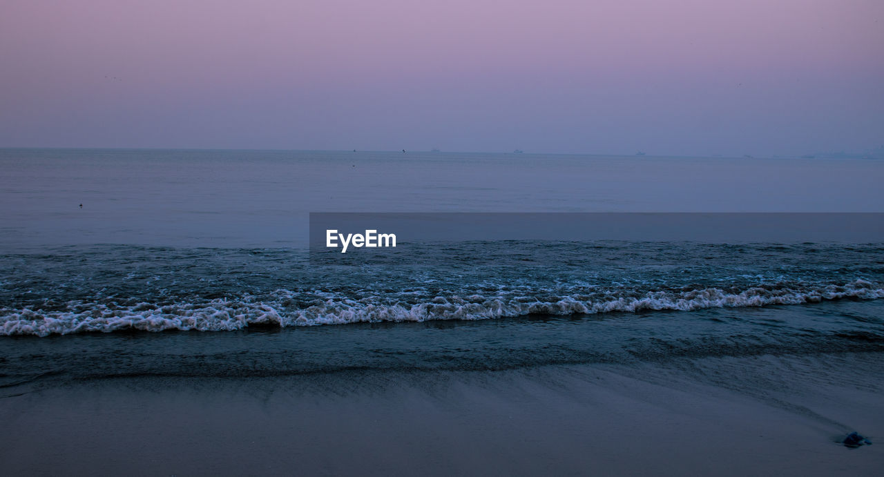 SCENIC VIEW OF SEA DURING SUNSET